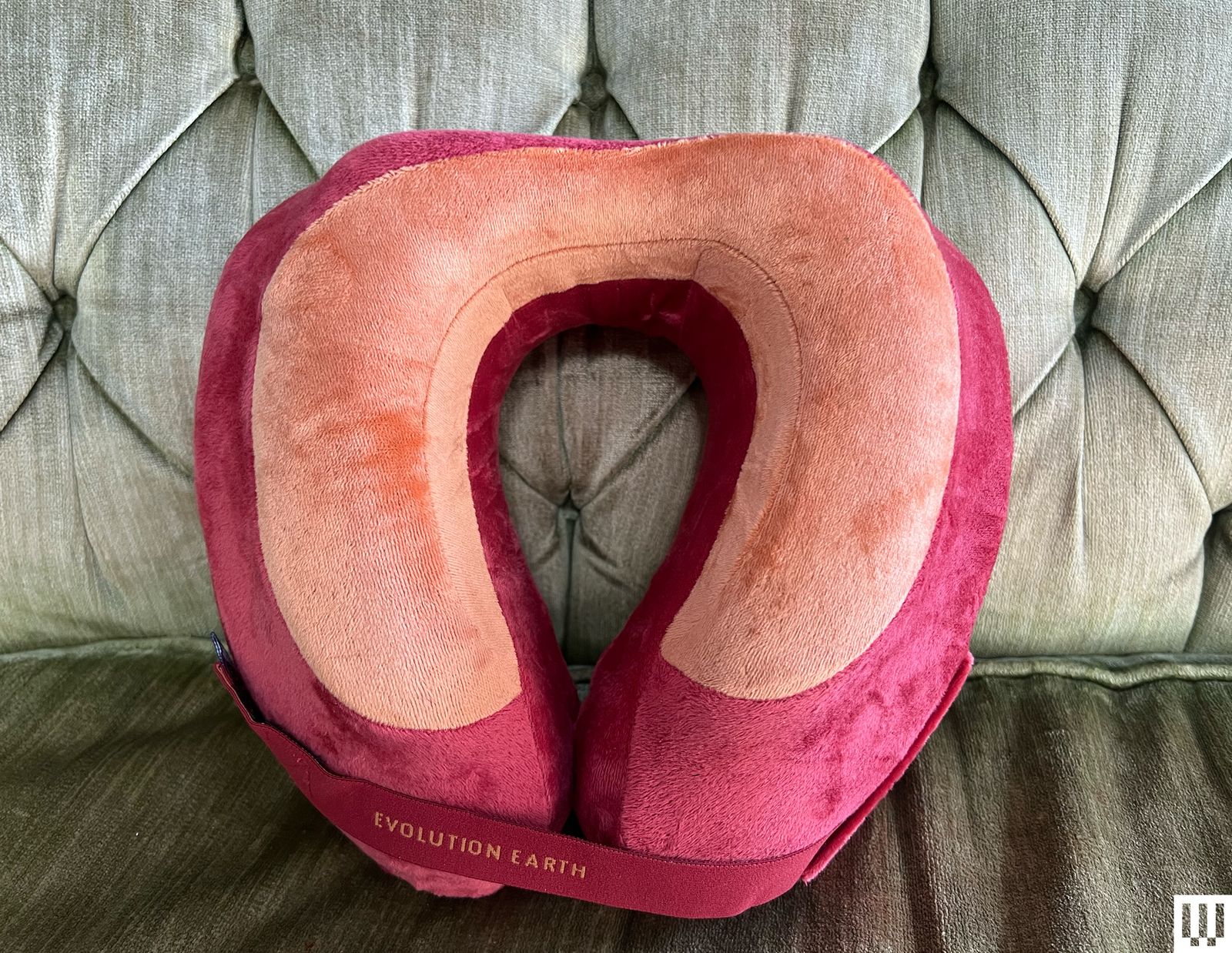 Cabeau Evolution Earth Neck Pillow in red and orange a ushaped pillow with front strap
