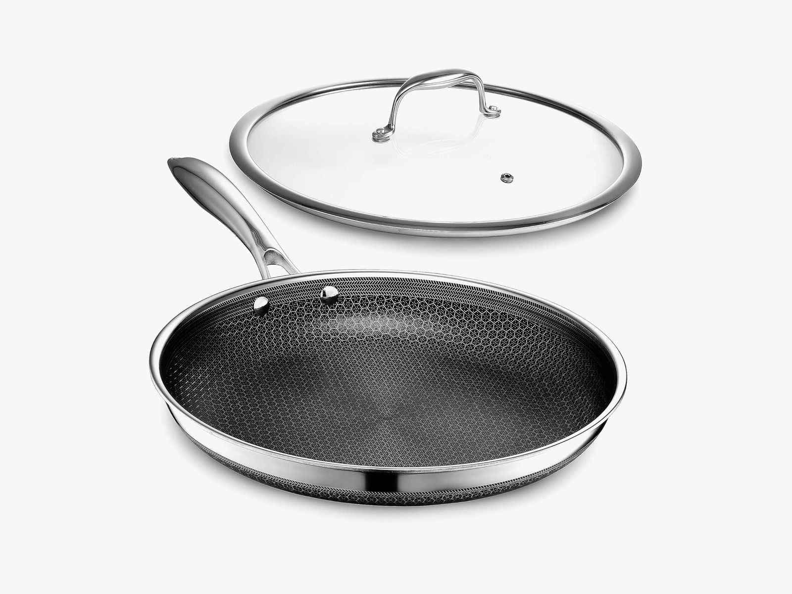 Silver cooking pan with the lid floating above