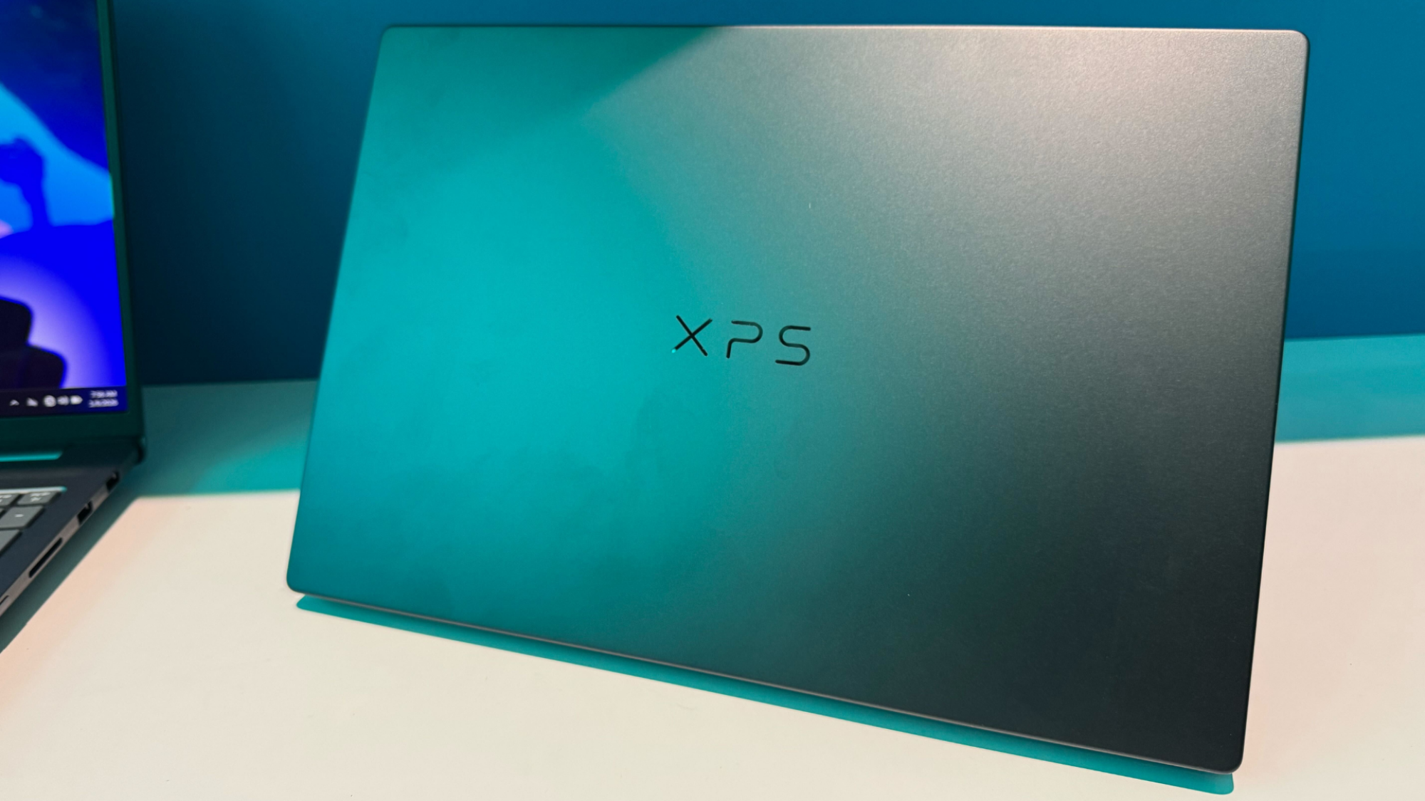 The Dell XPS 14's lid, showing the XPS logo, at CES 2026.